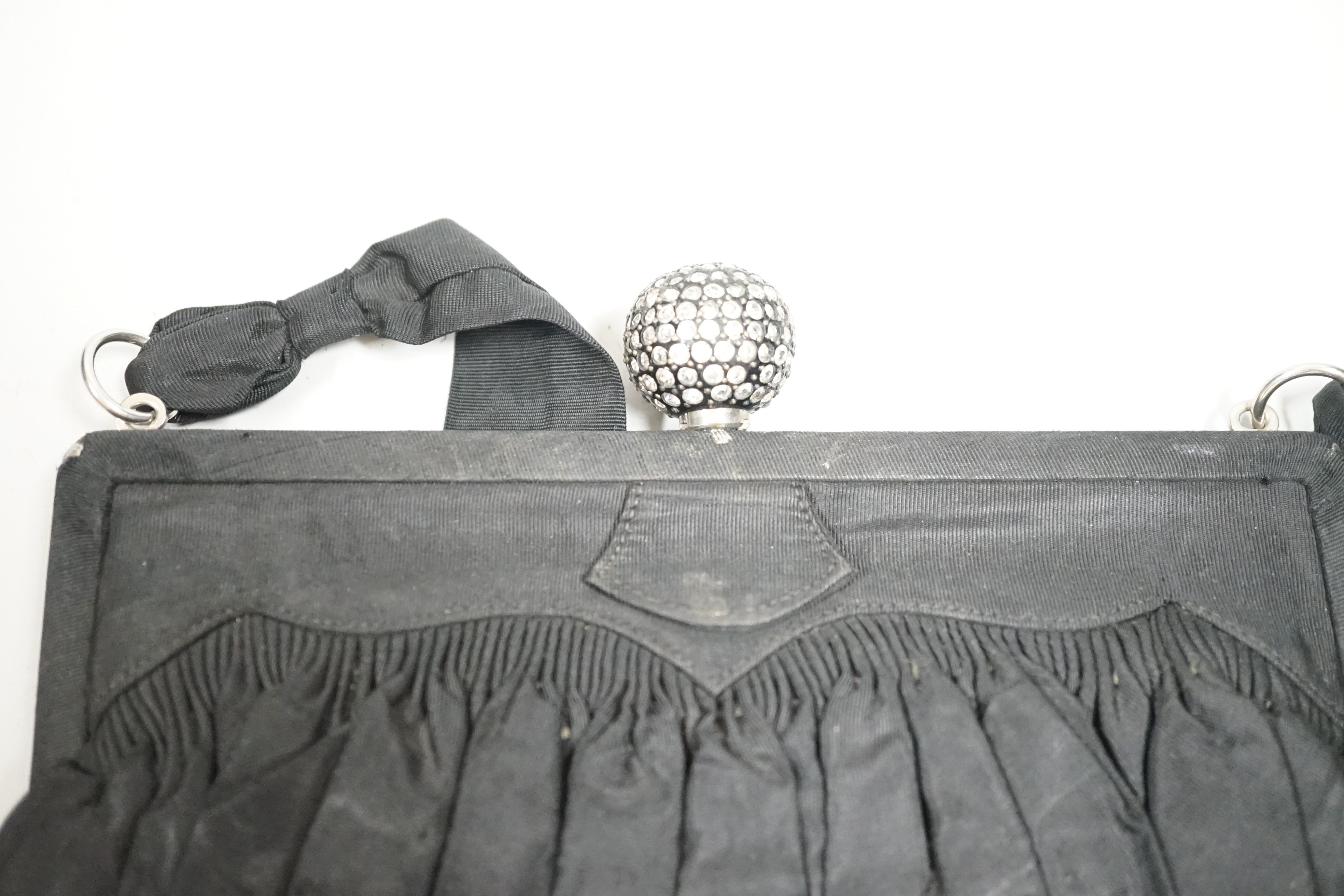 A 1930’s evening bag with silver frame, seven 1930’s-40’s evening bags with diamante encrusted Bakelite frames and clasps, a costume jewelled bag and two gilt and sequin bags